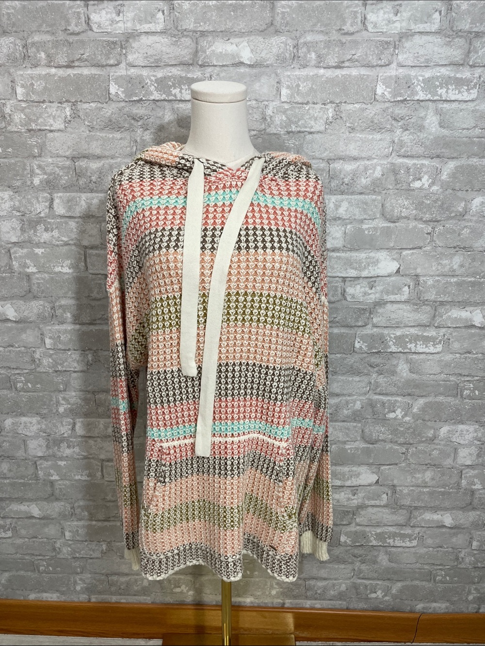 O'Neill Bailynn hooded sweater featuring a pastel, striped, open-knit design